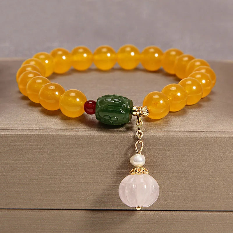 Yellow agate and crystal women's bracelet on gold silk cord with adjustable design