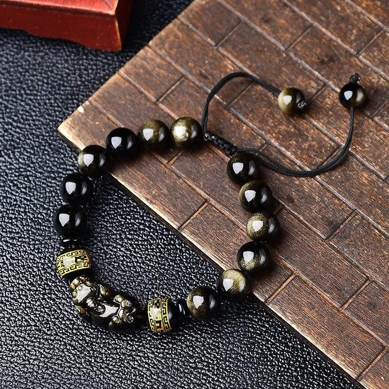 Natural obsidian Pi Xiu bracelet with hand-woven cord and golden sheen on black beads