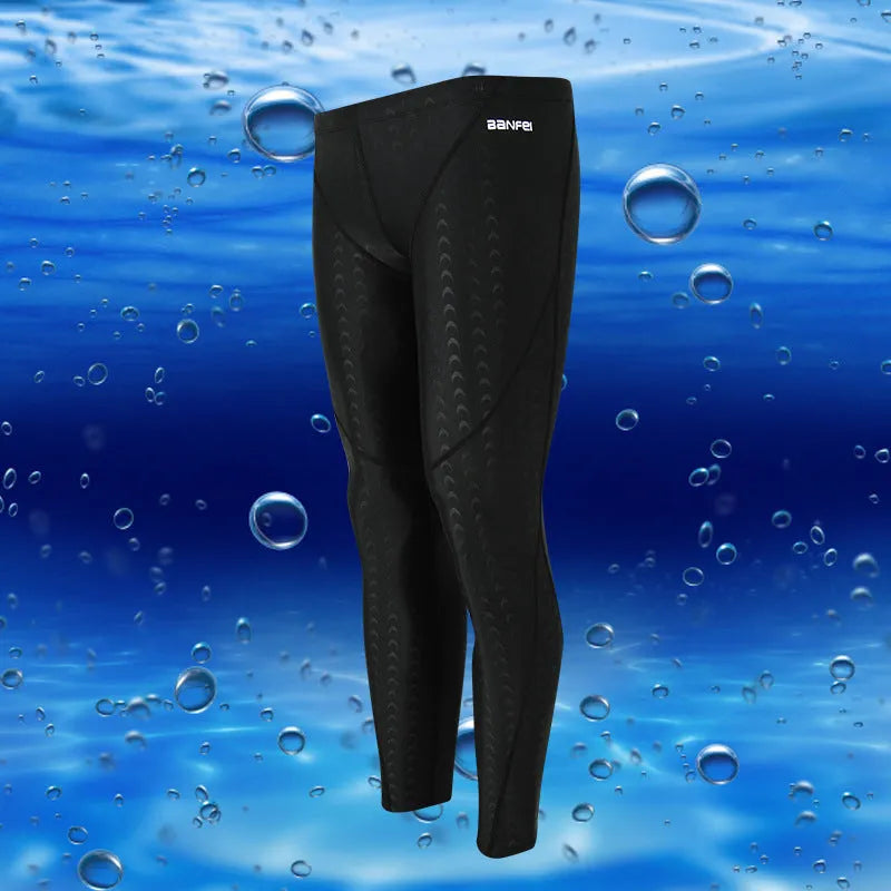 Men's black nylon cropped swimming trunks with a grey contrast stripe and internal mesh lining.