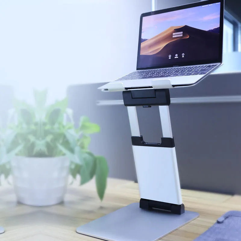 Silver aluminium alloy folding double-arm stepless stand holding a 17-inch notebook on a desk
