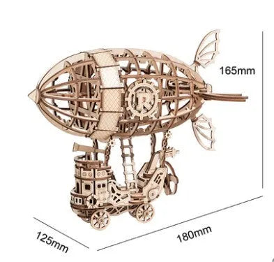 Wooden 3D puzzle model of a balloon assembled from pre-cut wood pieces on a light background