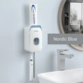 Automatic toothpaste dispenser in blue, grey, and pink colours made from ABS plastic.