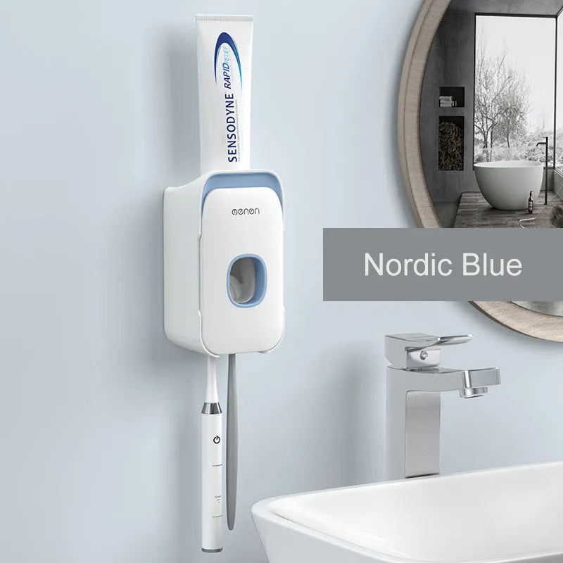 Automatic toothpaste dispenser in blue, grey, and pink colours made from ABS plastic.