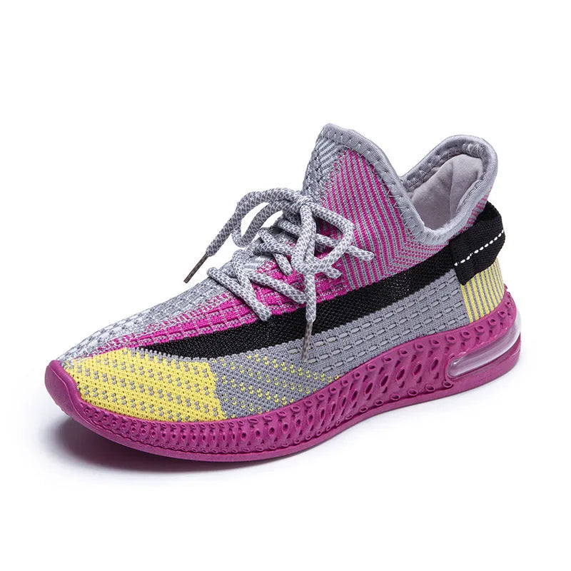 Women's lightweight breathable lace-up running shoes in black with round toe and low top profile