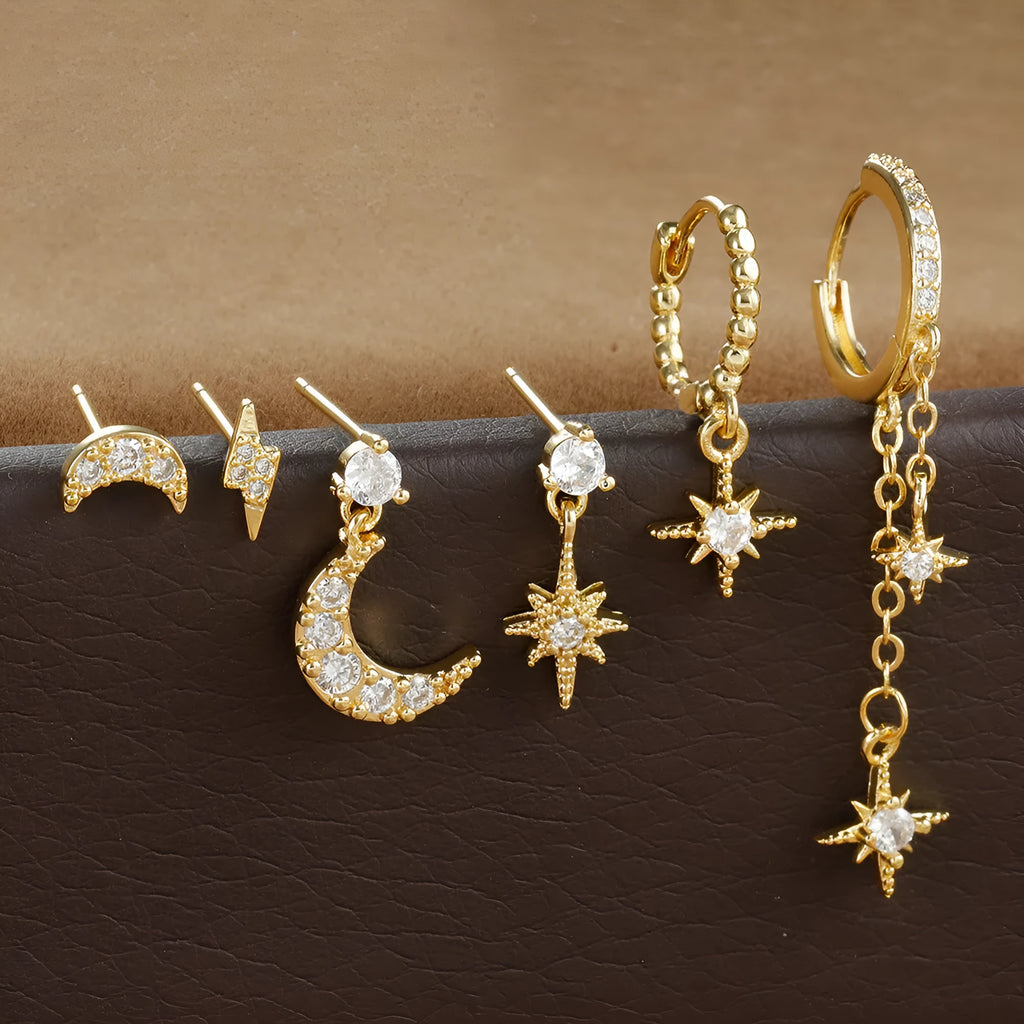 Six gold electroplated zircon stud earrings with chain tassel designs on copper base