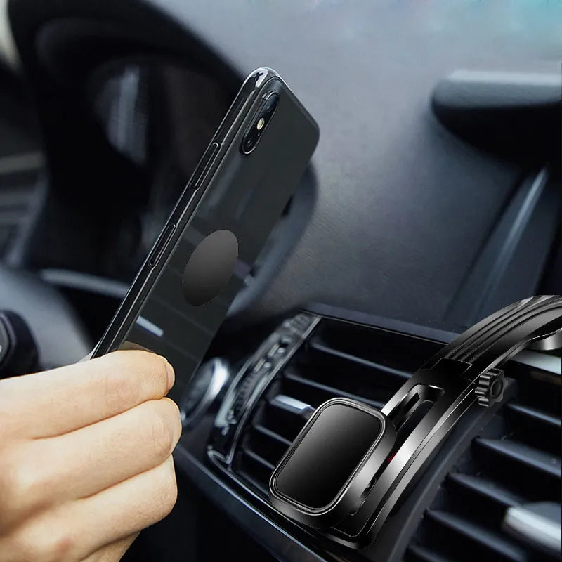 Creative magnetic desktop car phone holder with gooseneck arm and silicone surface in black