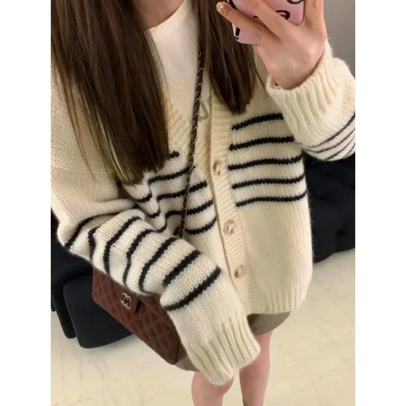 Women's grey collar button cardigan with 3D pattern, shown open and buttoned.