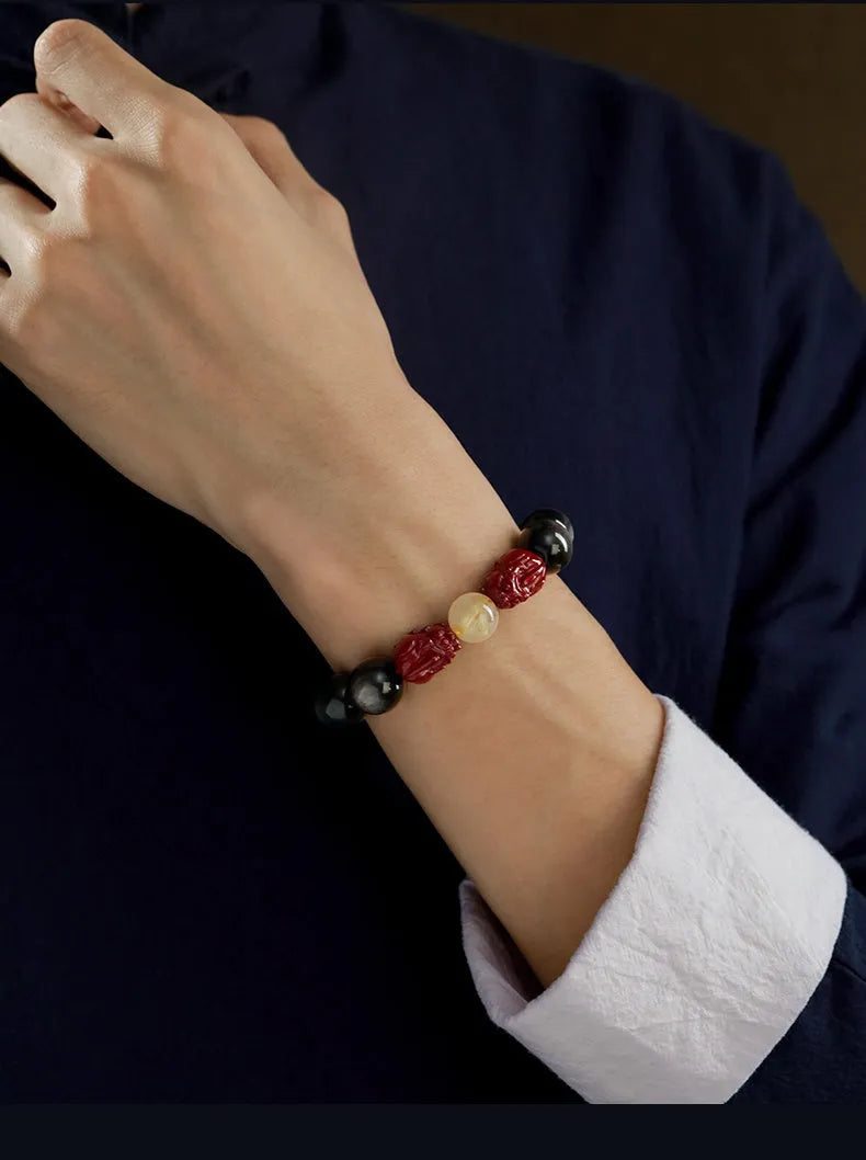Natural retro hand-beaded cinnabar bracelet with silver stone beads featuring carved animal zodiac motifs