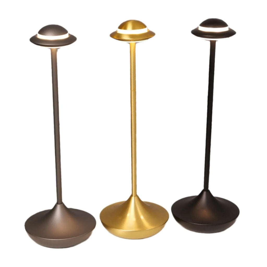 Modern UFO-shaped metal desk lamp with touch-sensitive base in black, gold, or grey finish.