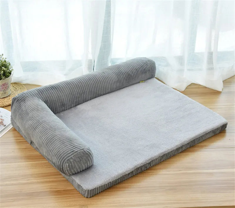 Corduroy pet dog sofa bed with non-slip base in a neutral colour on a wooden floor