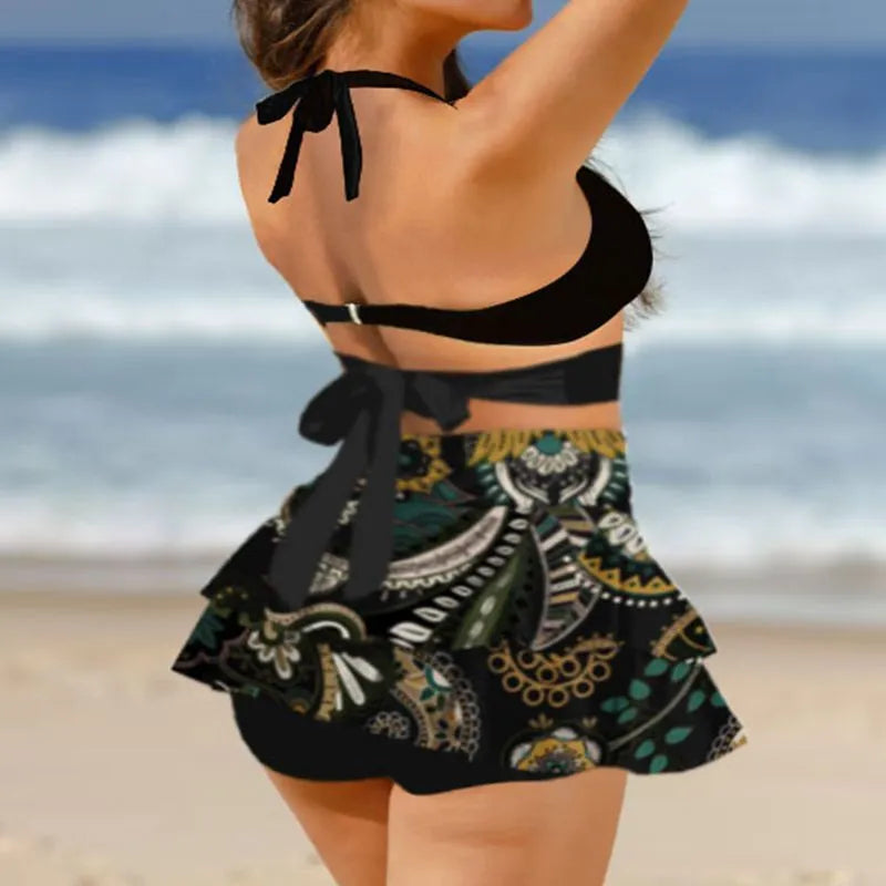 Women's purple bikini swimsuit with split skirt and lace-up detail, high waist backless design
