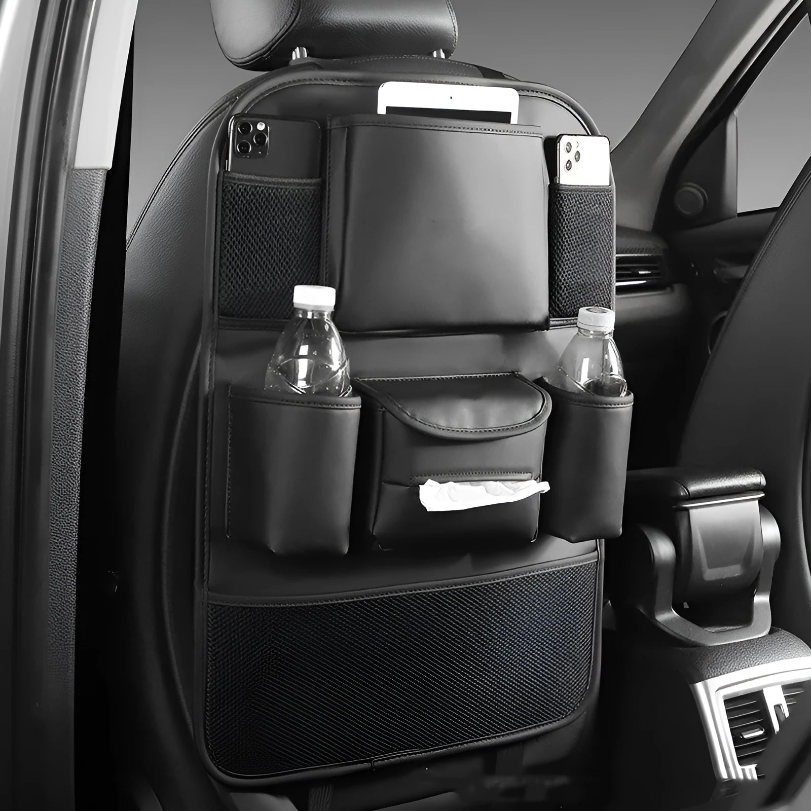 Genuine leather car seat back storage bag shown hanging on a car seat in one of four colours: black, grey, green or brown.