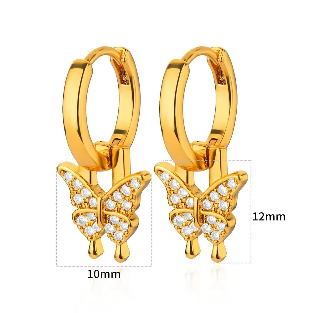 Copper butterfly earrings with irregular geometric design combining heart, bow and star shapes in diamond colour treatment