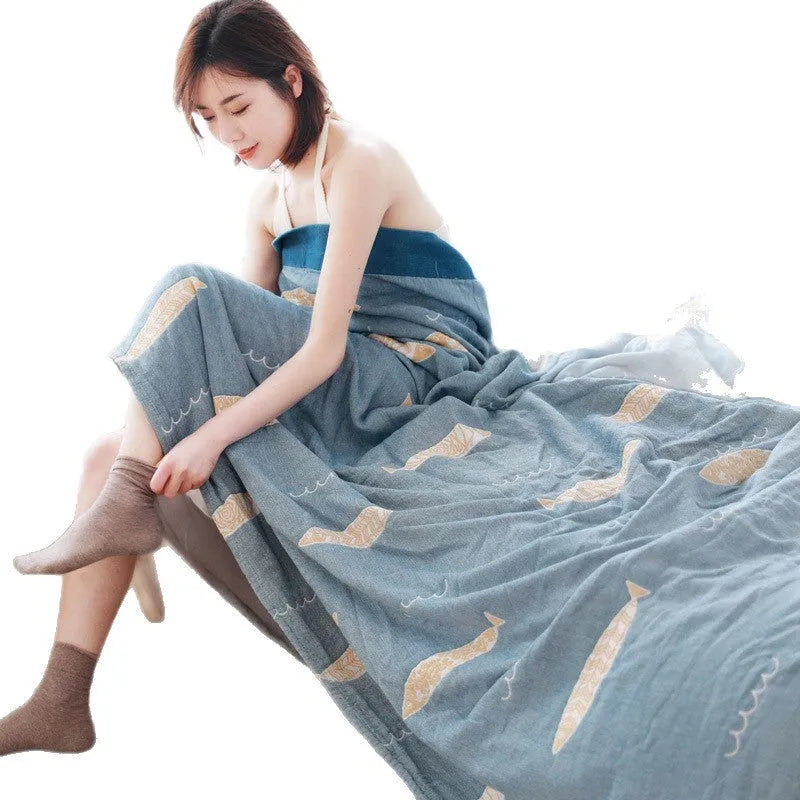 Pure cotton five-layer gauze bed sheet blanket in Roulette Wheel Blue pattern, shown on a bed.