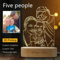 Custom photo 3D stereo night light with acrylic shade on a desk, displaying a clear portrait with soft glow