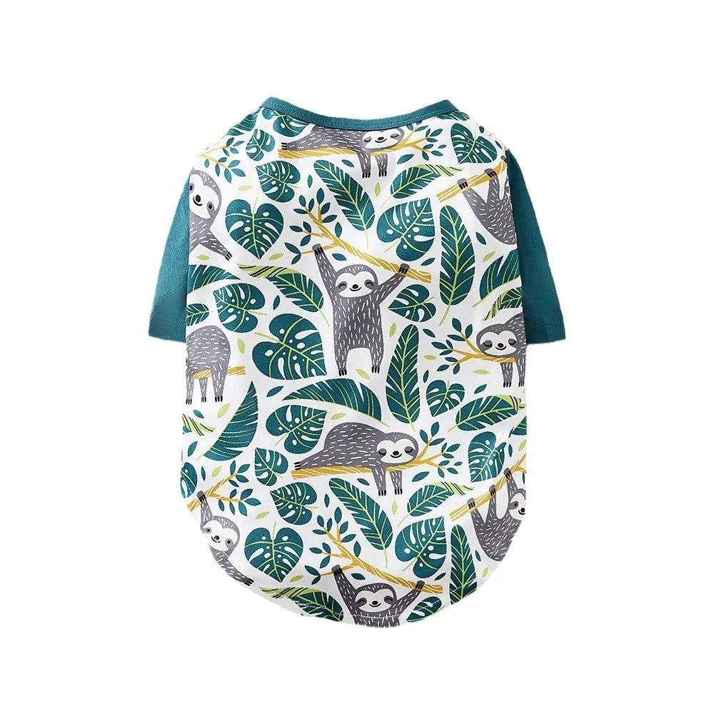 Colourful printed polyester t-shirt for a small dog, showing size options S, M, L, XL, XXL.