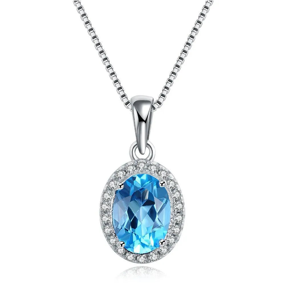 925 sterling silver geometric jewellery set with blue topaz stones including earrings, ring, bracelet and necklace