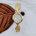 Women's stainless steel watch with round dial showing gold face colour option and Vachette clasp buckle