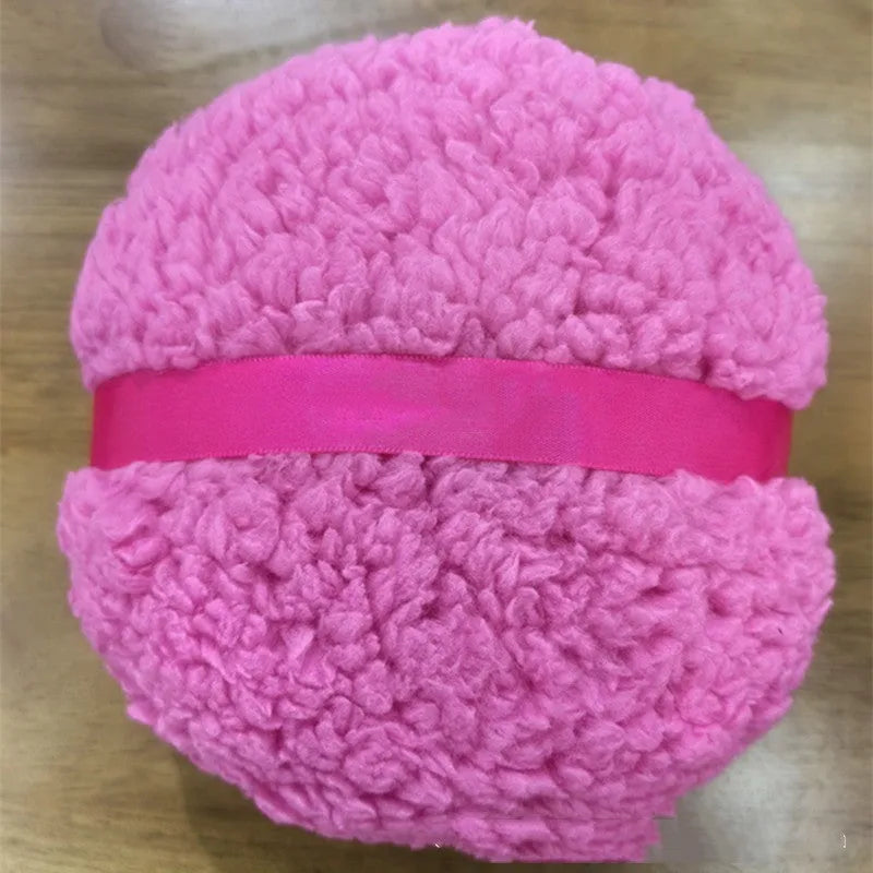 Oversized rectangular plush powder puff for makeup, shown in pink, white, and skin colour options.