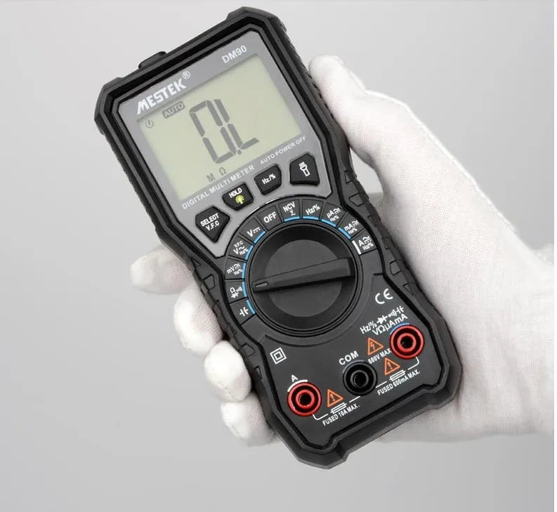 DM90A digital multimeter with display showing readings, includes test leads for electrical and temperature measurement.