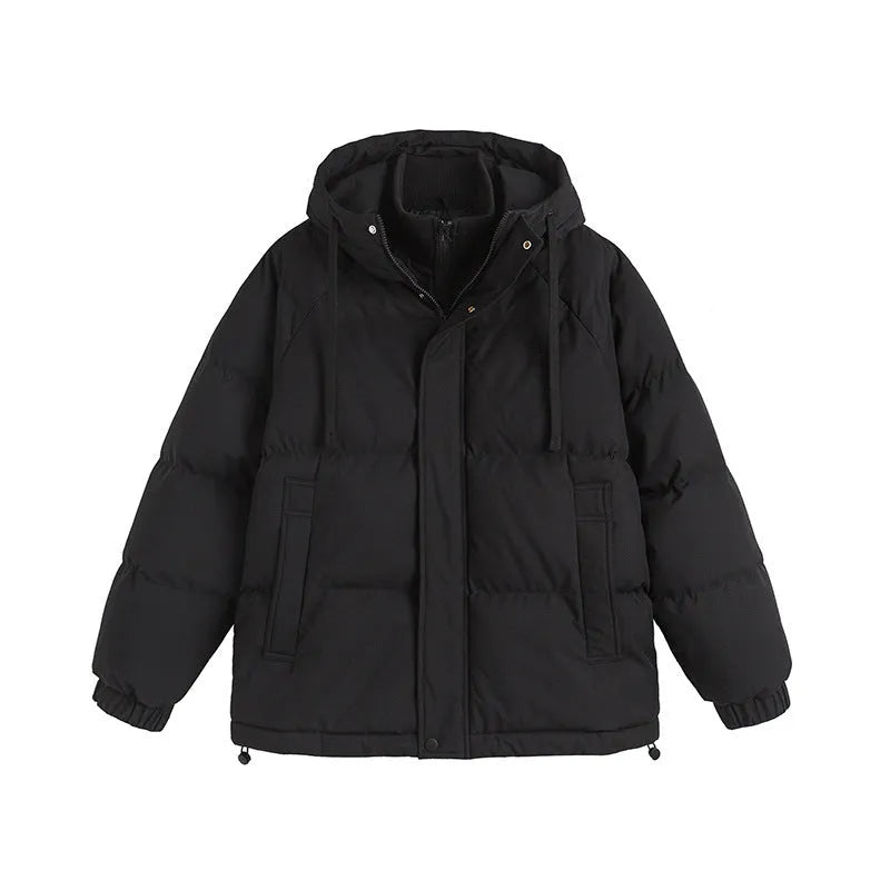 Beige loose fake cotton-padded winter jacket with side seam pockets on a mannequin.