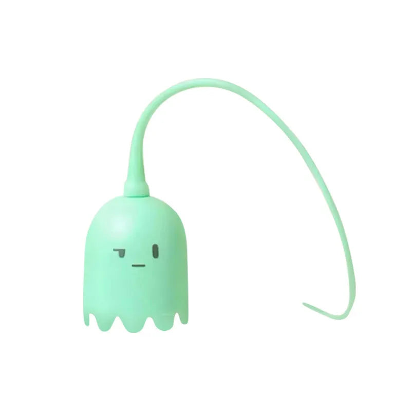 Green automatic cat wand toy with swinging silicone tails for indoor cats on wooden floor