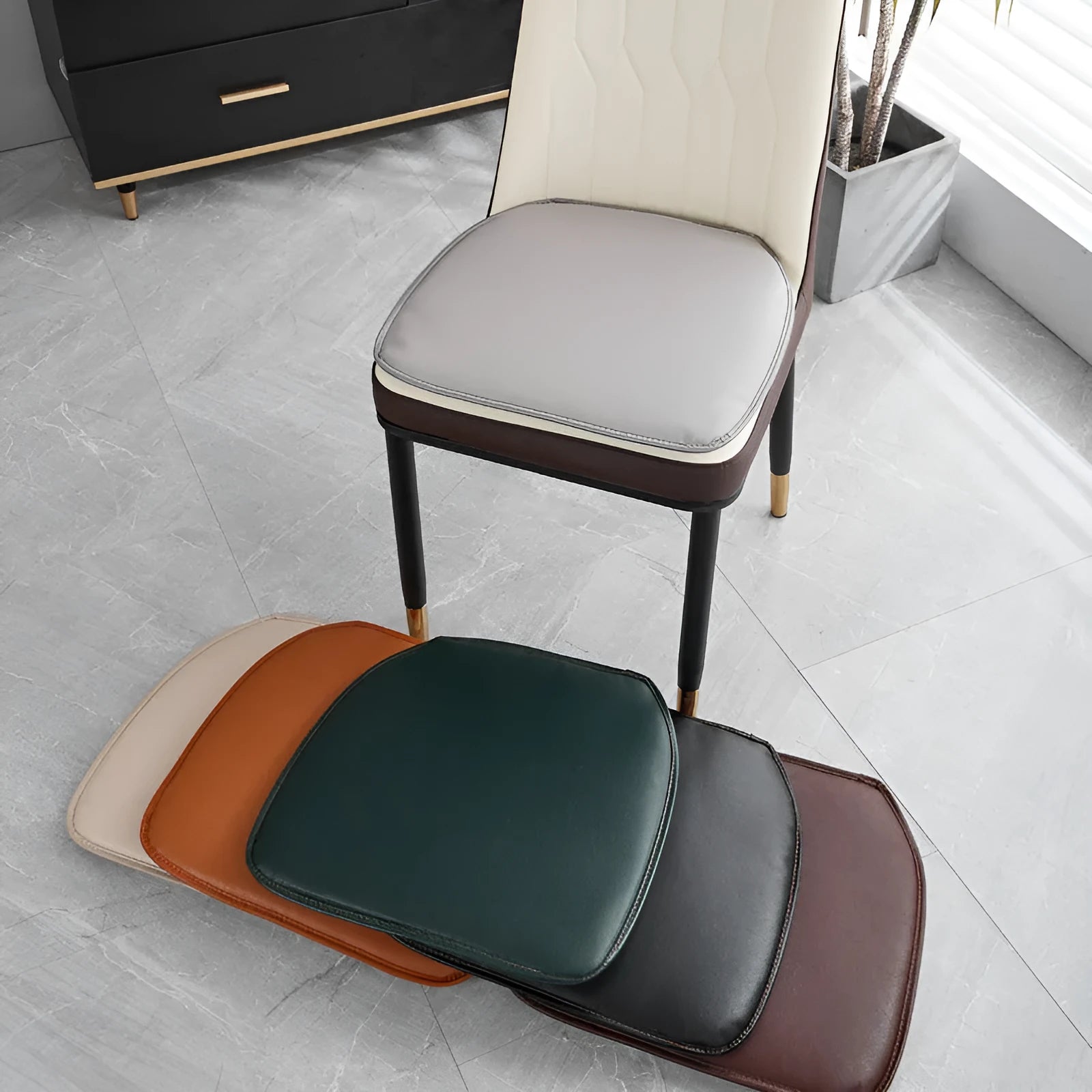 Leather horseshoe-shaped seat cushion in beige colour showing curved back support design