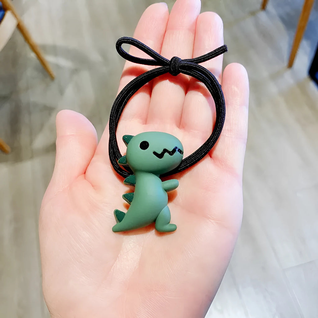 Animal cartoon hair accessories with crocodile dinosaur and frog designs in plastic resin material for women