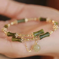 Women's fashion bamboo joint coloured glaze bracelet in plum wine with baking varnish finish