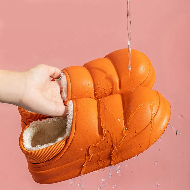 Women's waterproof EVA winter house slippers in multiple colours with plush lining and non-slip sole.