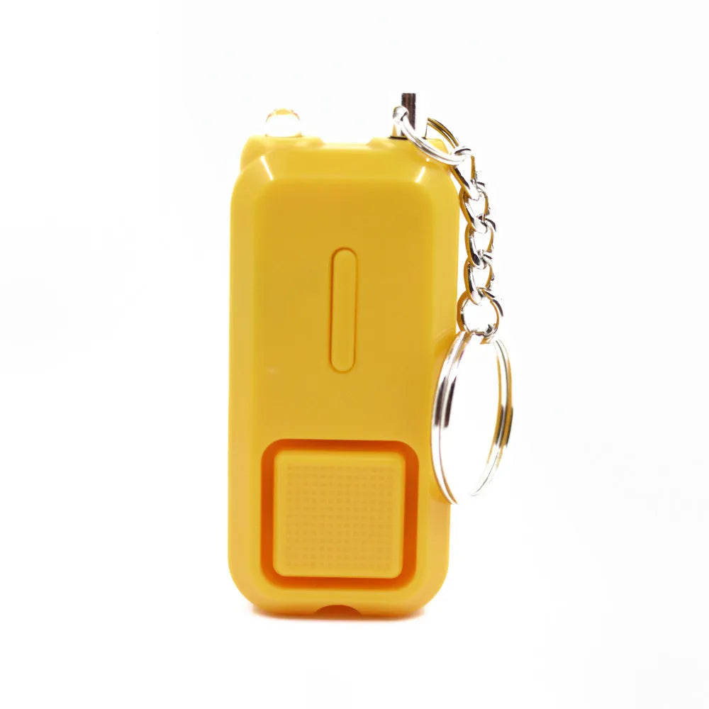 ZQ-202 personal safety alarm in pink, showing compact keychain-sized design.