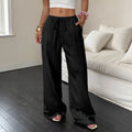 Women's black wide-leg trousers with lace-up waist trimming detail on mid waist
