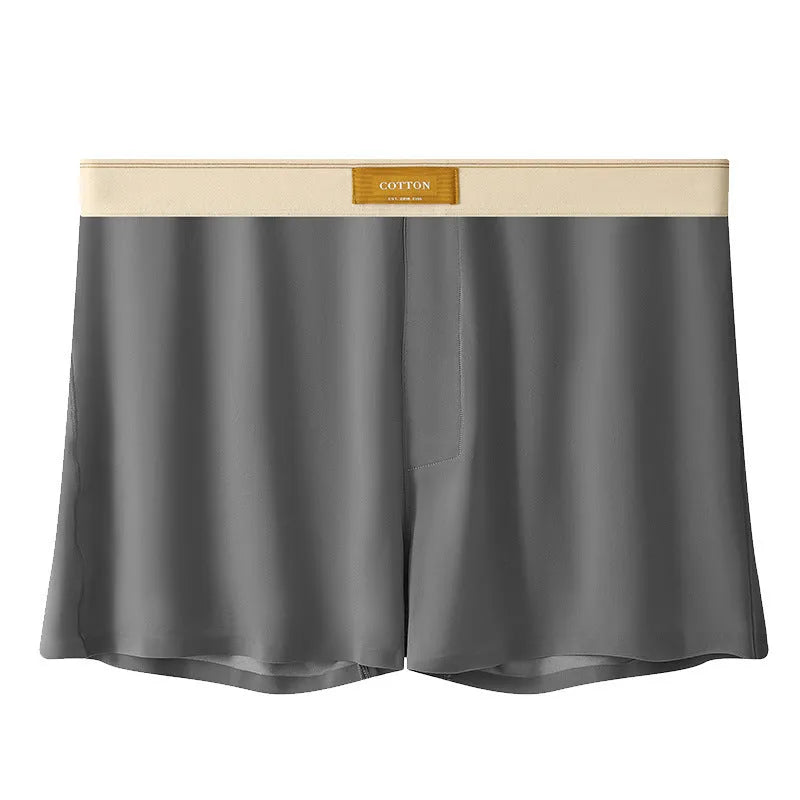Pack of three men's solid colour loose fit ice silk boxer shorts on a mid waist.