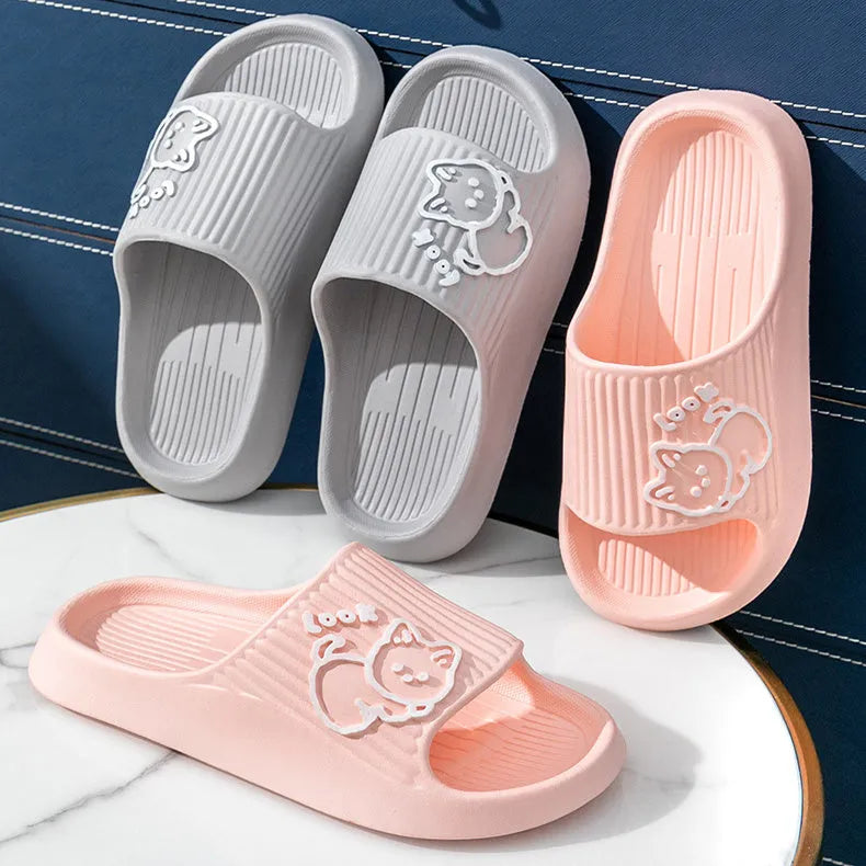 Green EVA platform slippers with a cat design on the upper, showing the thick non-slip sole.