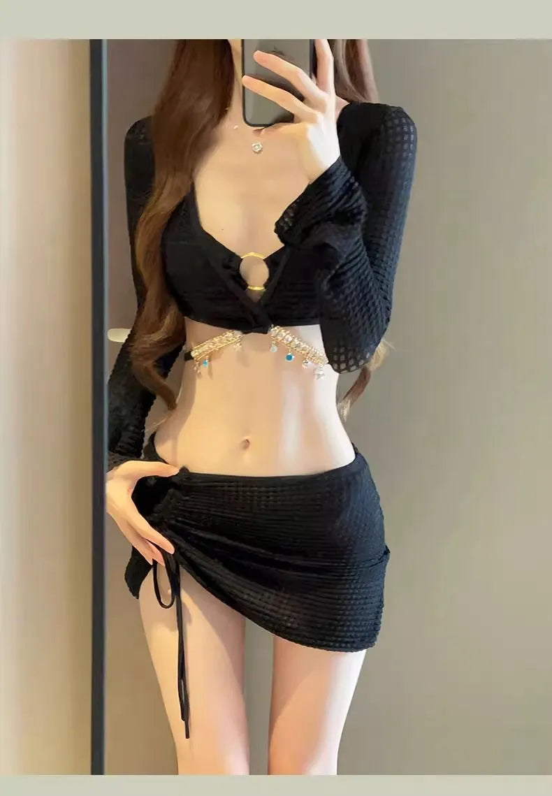 Women's long sleeve split bikini swimsuit in black polyester front view