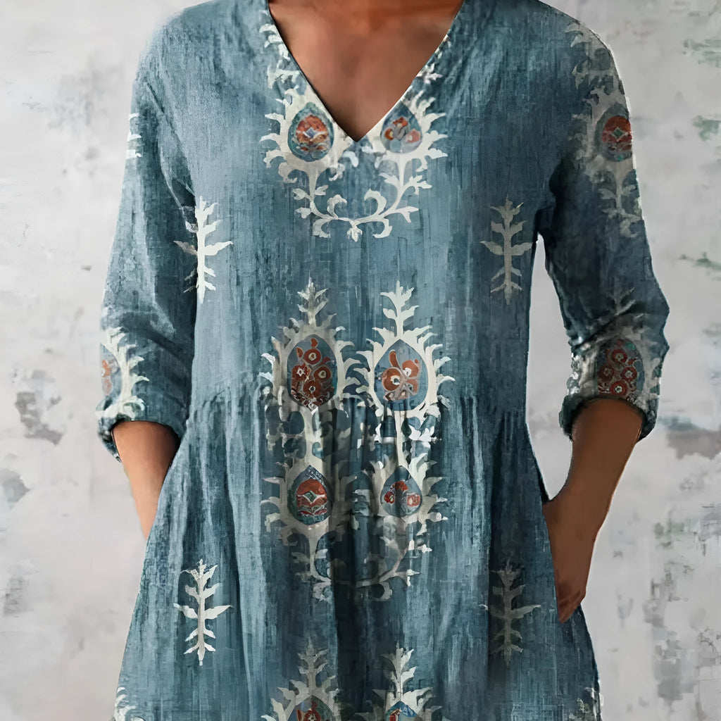 Women's printed loose dress with 3/4 sleeves and wide waist design in floral pattern