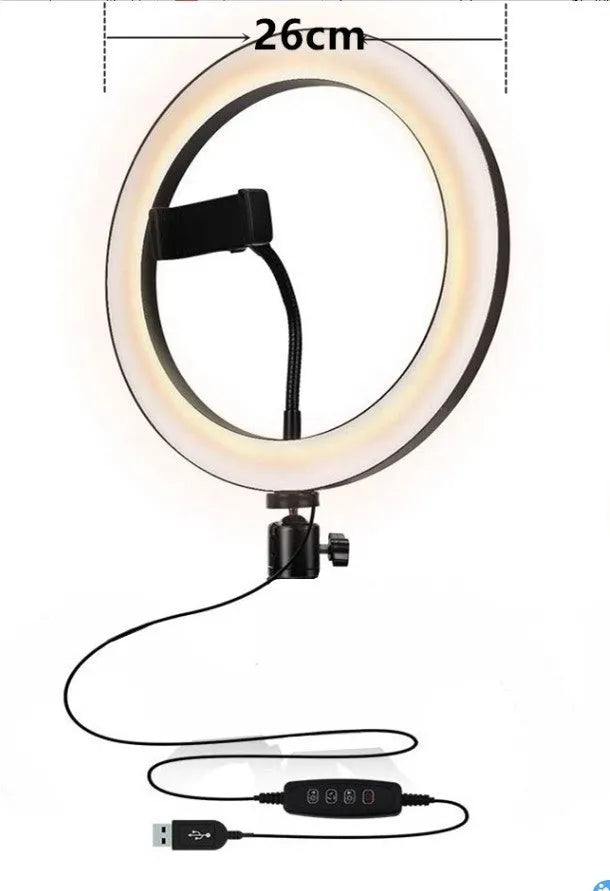 Aluminium adjustable live phone stand with tripod base extended to full height on a desk.