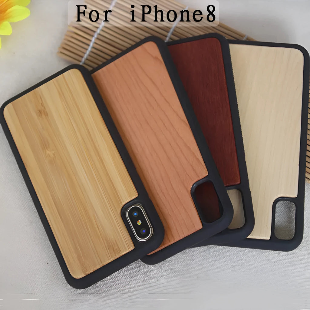 Wooden iPhone case with carbonised bamboo back and black TPU edges on a table.