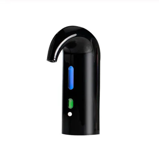 Portable electric wine decanter in black with red light, ABS and silicone body, on a table next to a wine glass