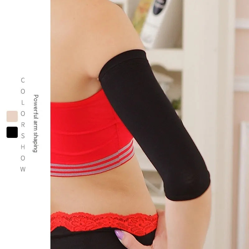 Women's black nylon shaping arm sleeves showing free size design for discreet wear under clothing