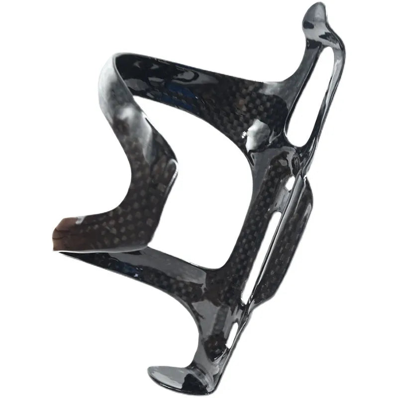 Black carbon fibre side pull water bottle cage for bicycles on a bike frame.