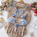 Light blue lace embroidered women's bra and pants set with transparent mesh design.