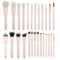 26 pink makeup brushes with wooden handles displayed in a open pink PU travel case
