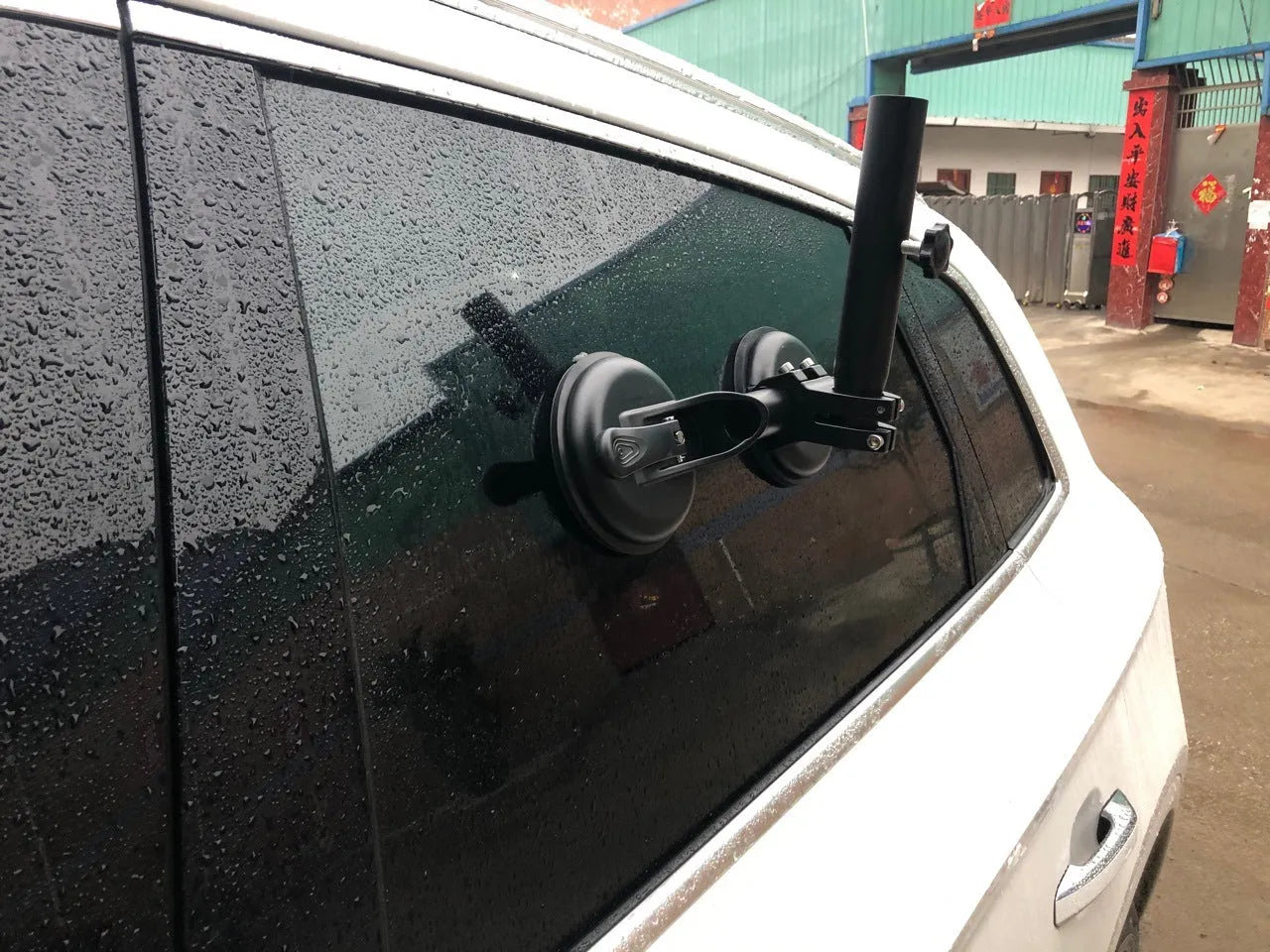Black off-road car flagpole sucker base with round rubber suction cup and ABS plastic body.
