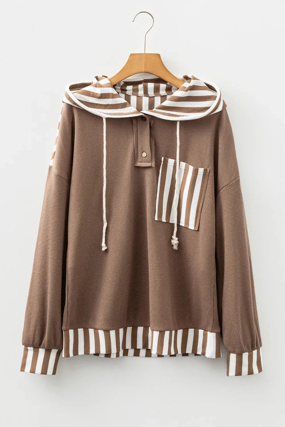 Straw yellow women's hoodie with waffle texture, patchwork stripes, a drawstring hood, and button neck.