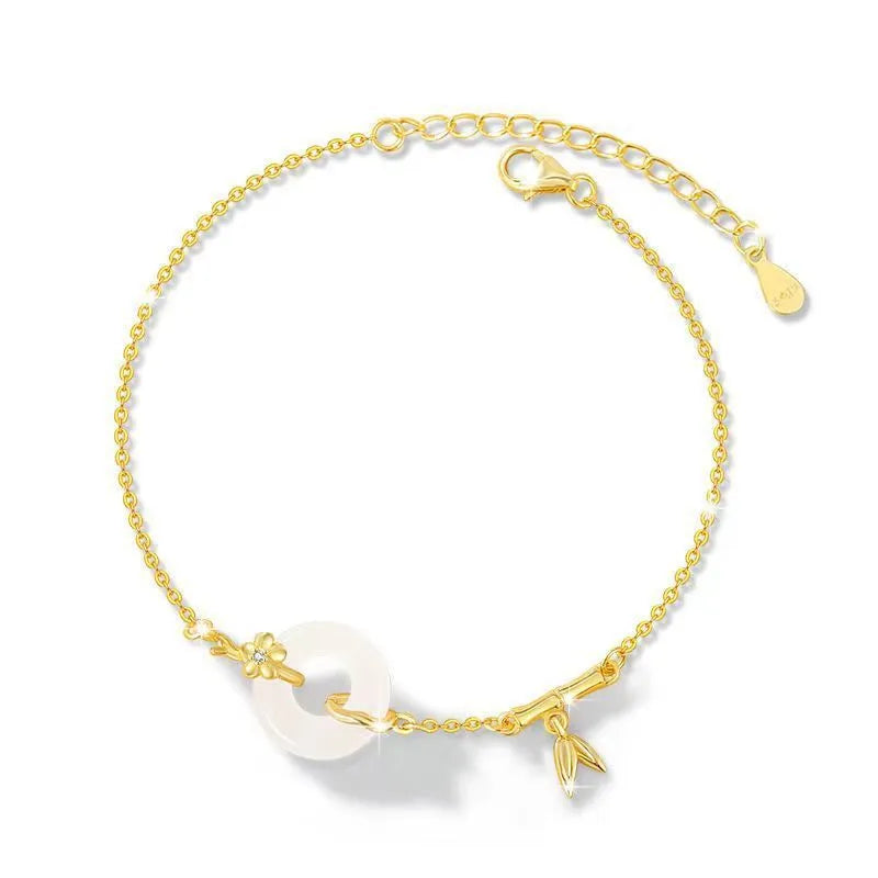 White chalcedony bracelet with peace buckle in silver gold electroplated finish on silver base