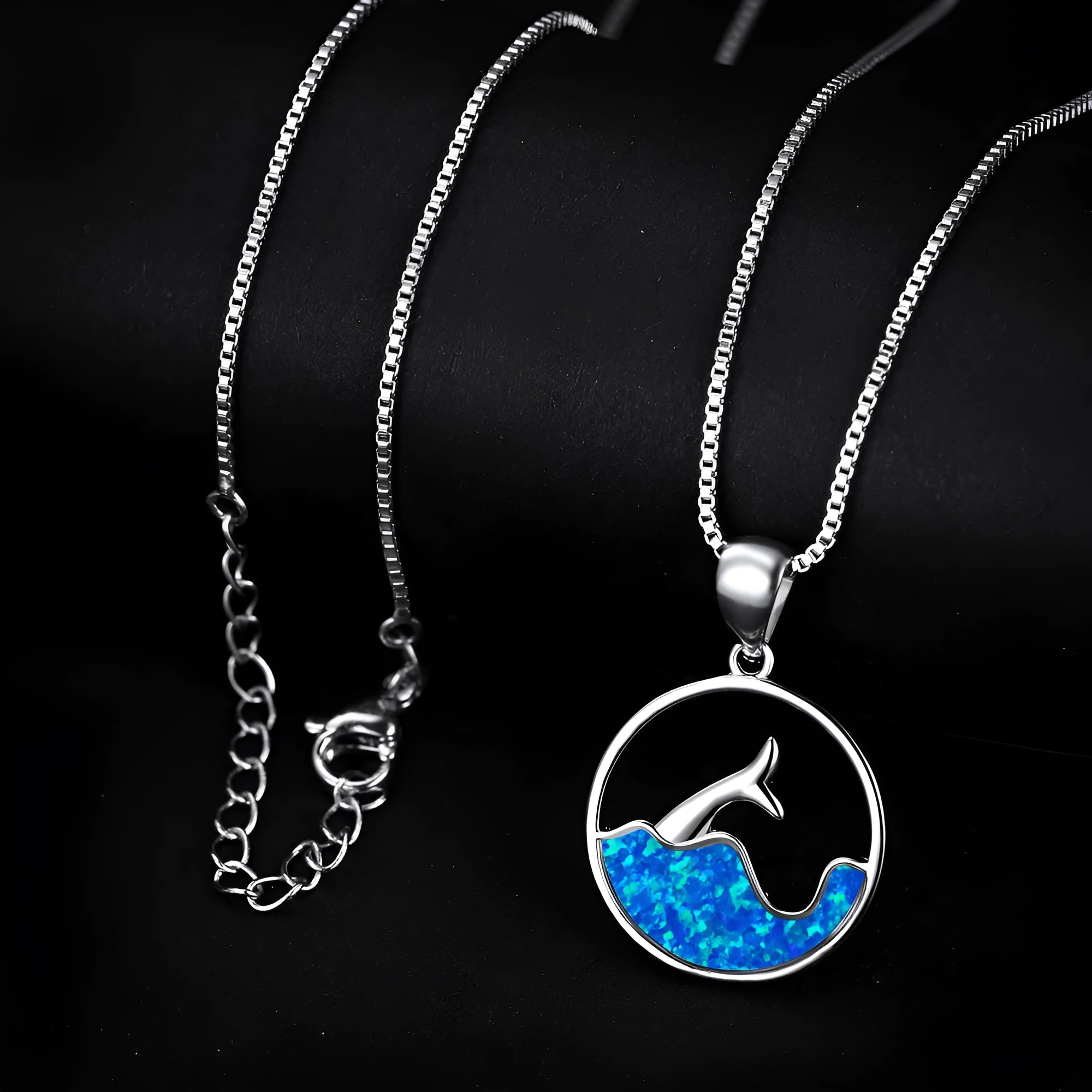 White gold electroplated copper fishtail necklace with geometric round pendant design