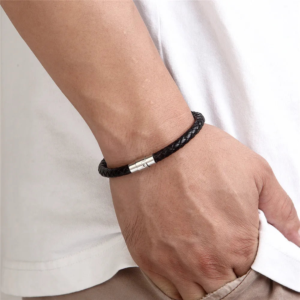 Geometric titanium steel bracelet with magnetic clasp shown in silver tone.