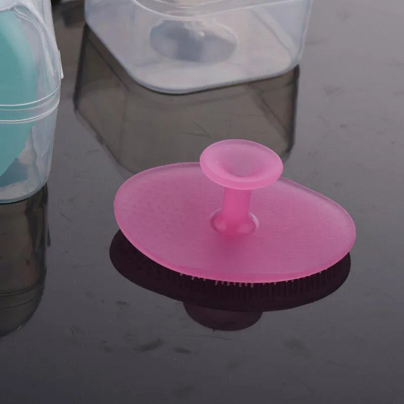 Silicone facial brush with three bristle types: tiny, middle, coarse; blue colour; 53mm size; for face cleansing and massage.