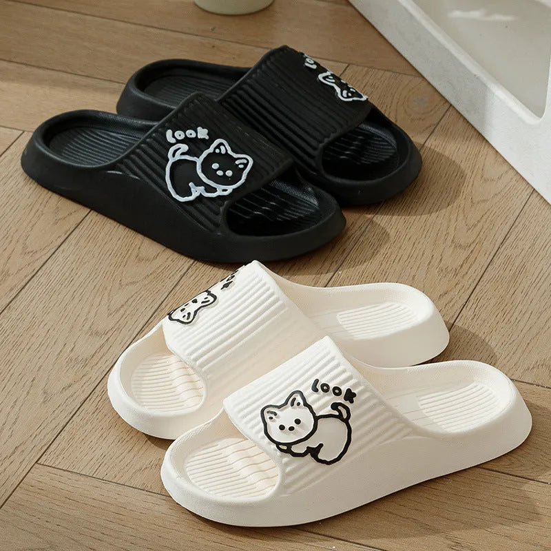 Green EVA platform slippers with a cat design on the upper, showing the thick non-slip sole.